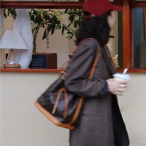 Louis Vuitton Brown Shoulder Bag with Iconic Monogram Pattern